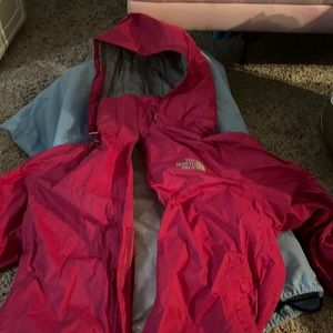 Vintage (2010s) north face rain jacket. Light west and tear on the velcro. Pink.